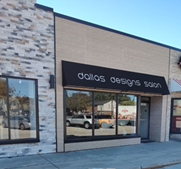 A commercial building in Oak Park Michigan with a flat roof and brown awning.
