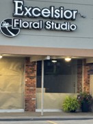 A commercial building in Oak Park Michigan with an Excelsior Floral Studio sign.