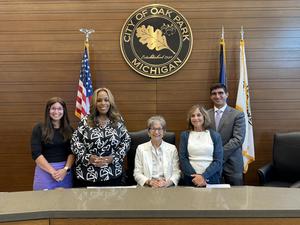 Members of the 2026 Oak Park Michigan City Council in the council chambers.