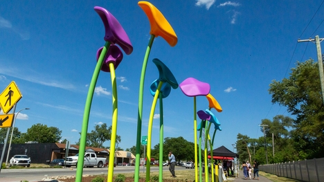 A collection of giant metal flower sculptures that line 9 Mile Road in Oak Park, Michigan.