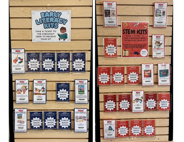 Image of slatwall display that holds the early literacy kit tickets and the STEM kit tickets. Image shows slatwall with pockets holding tickets for kits in youth department.